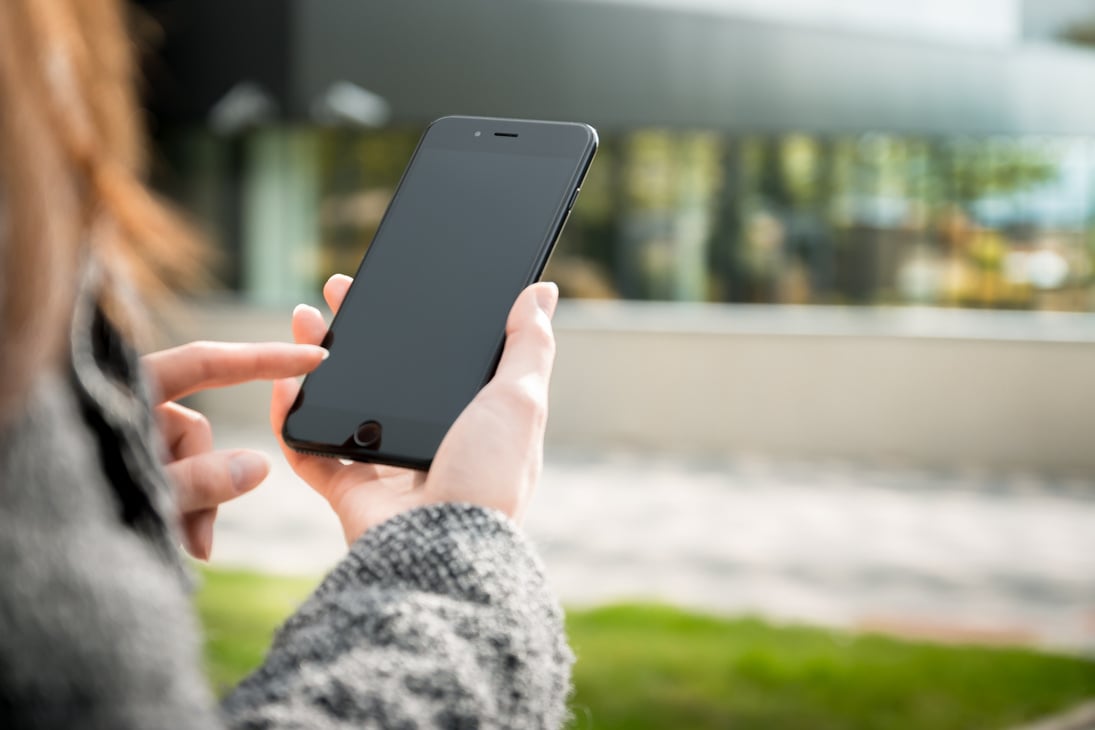 Woman Using Phone